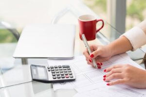 Sacramento Bookkeeping Close Up Of Female Hands Doing Calculations SBI 325536991