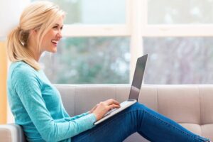 Sacramento Bookkeeping Joyful Woman Working On Her Laptop At Home SBI 317524088